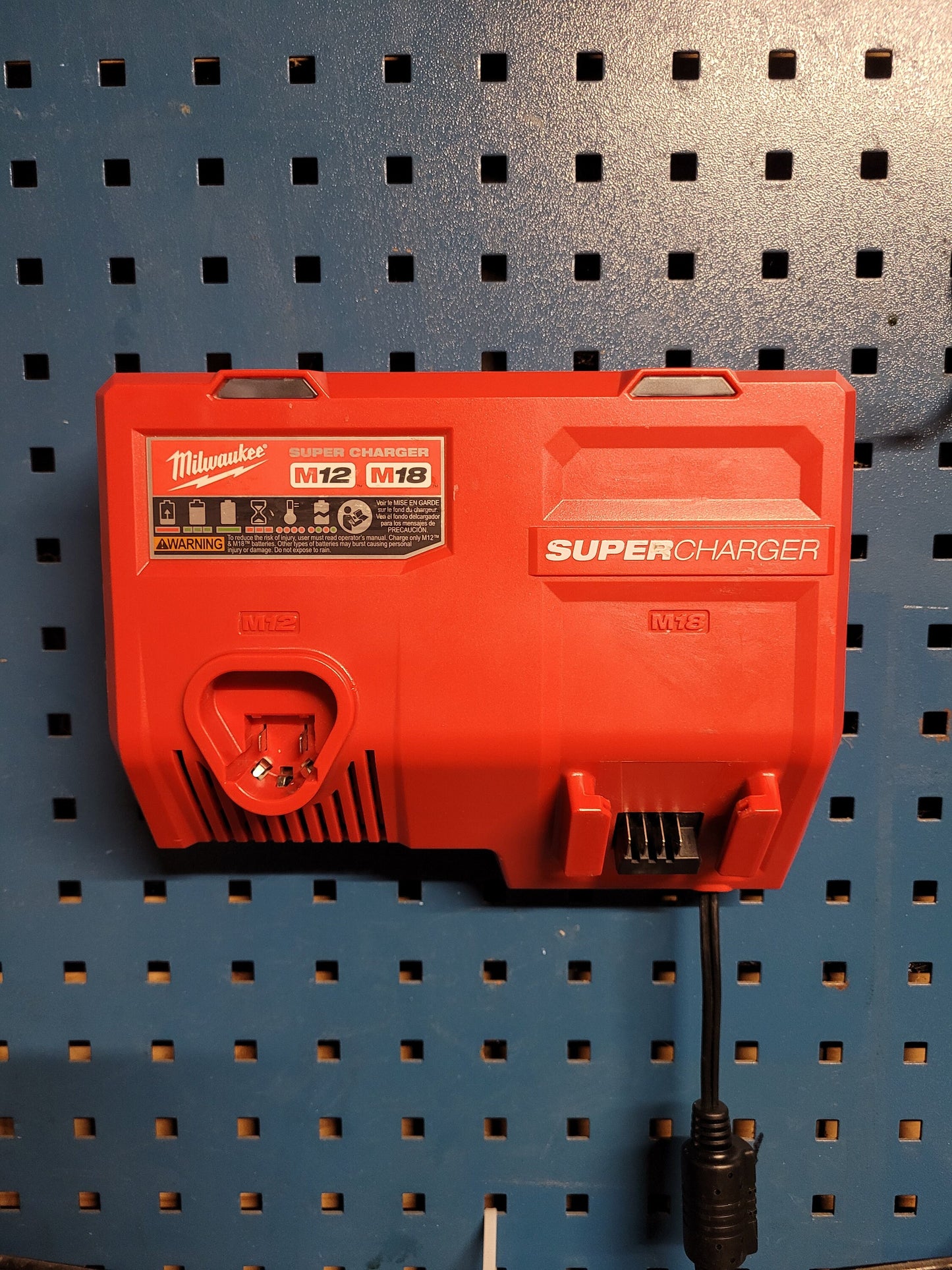 Milwaukee M12 M18 Super Charger Mount, Cat. No. 48-59-1811, Uses Three Neodymium Bar Magnets for Strong Hold on Metal Surface