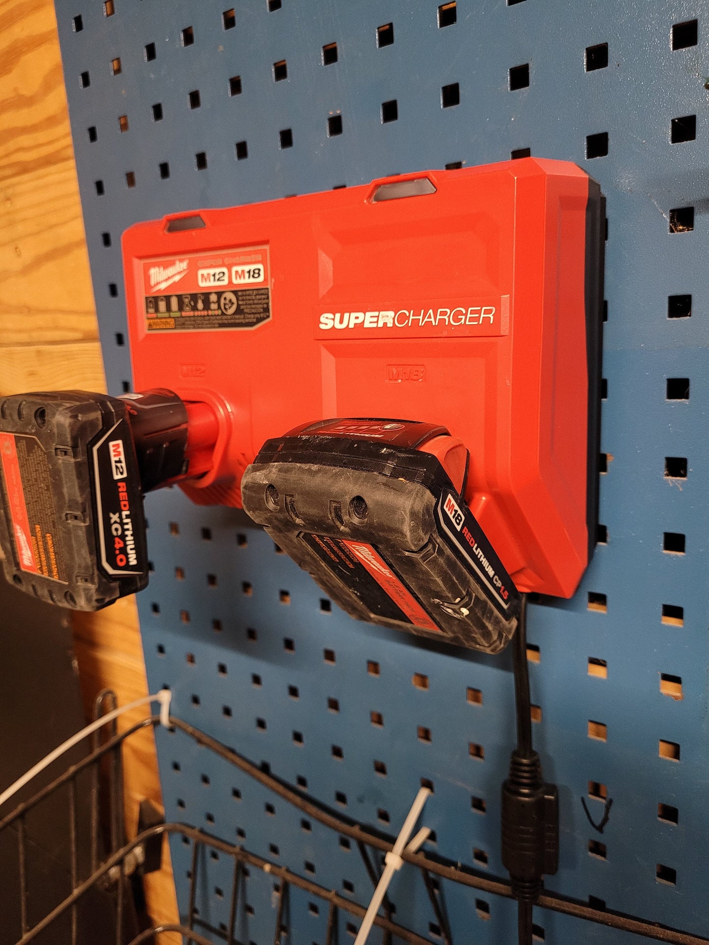 Milwaukee M12 M18 Super Charger Mount, Cat. No. 48-59-1811, Uses Three Neodymium Bar Magnets for Strong Hold on Metal Surface